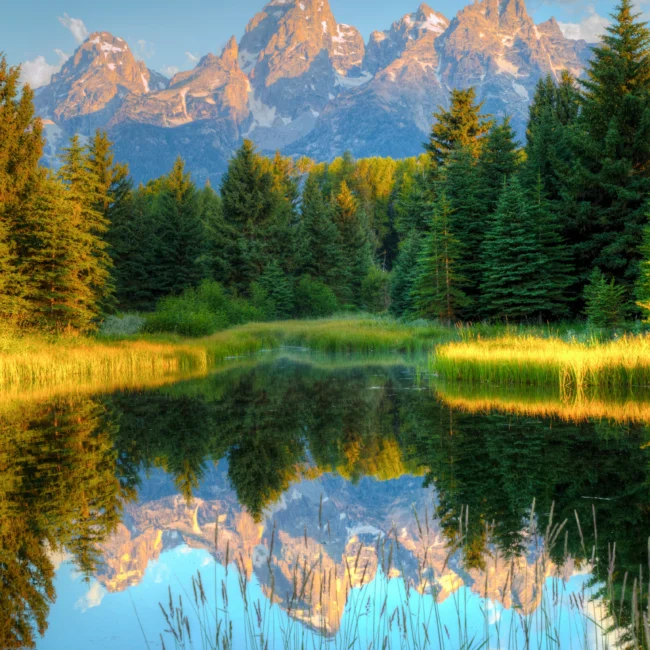 Lake acting as a mirror in Grand Teton, one of the best national parks in North America