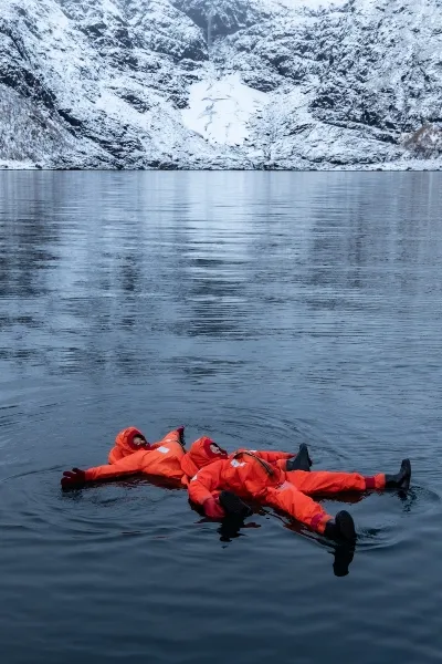 Winter activities in Norway. Swiming in the cold